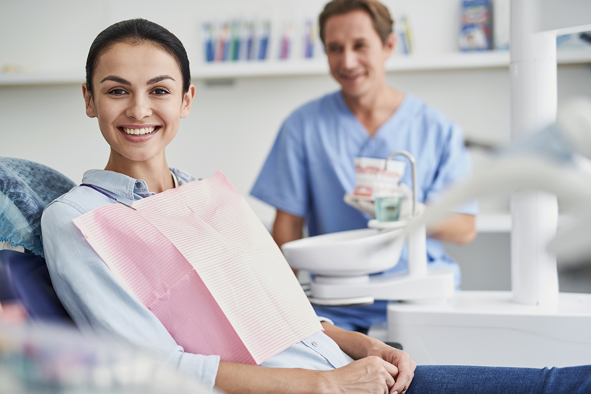 woman smiling about saturday dental appointments