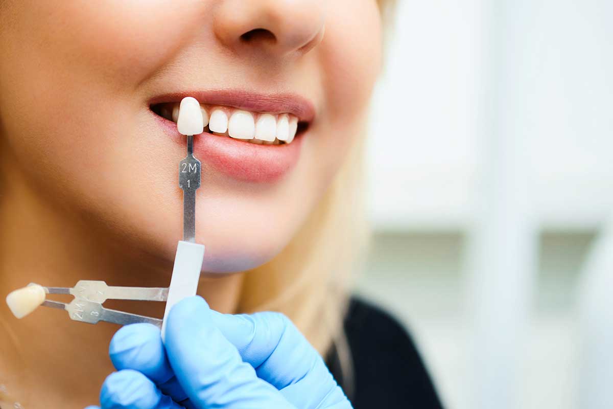 woman being fitted for a single tooth implant