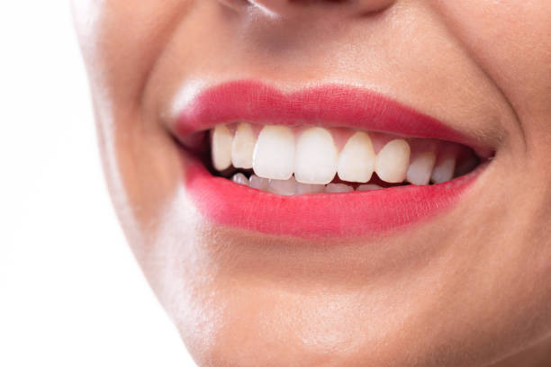 image close-up shot of a person's perfectly white teeth