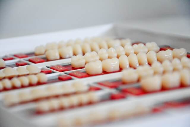 dental crowns laid out on a surface