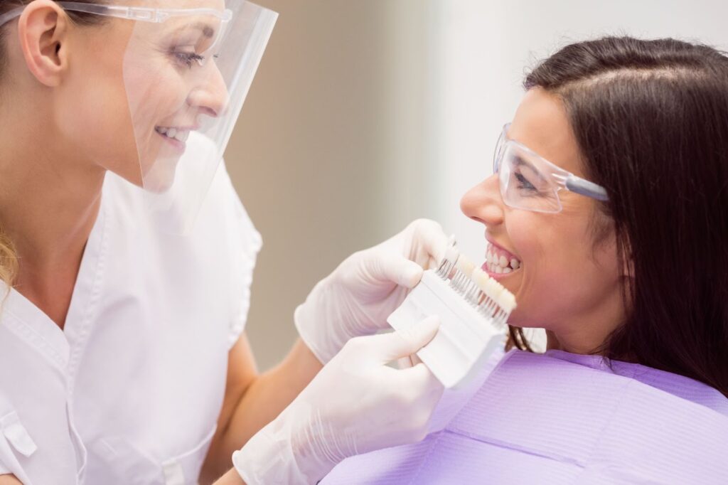 a dentist and patient finding the perfect veneer shade